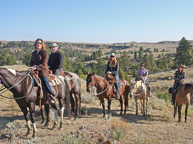 On the trail with Bitter Creek Outfitters, Billings, Mont. Theresa Kuhlman, far right, opened the business operating on her father&#039;s 7,000-acre ranch. Her father, Steve Kuhlman (not shown), runs a cow-calf operation on the same land. (Progressive Farmer photo by Deborah R. Huso)